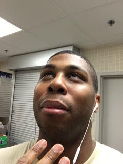 Lia's husband fanning himself as he listens to more of the book 