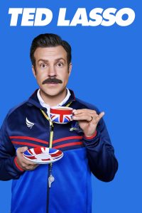 Ted Lasso poster with Jason Sudeikis holding a union jack printed teacup and saucer with his pinky up looking earnestly at the camera