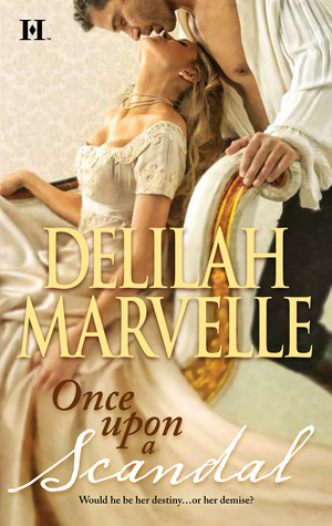 Delilah Marvelle - a photo of a white woman with blonde hair sitting in achair with her head back. She's wearing a square neckline embroidered gown, and her head is tipped back as a man leans down to kiss her
