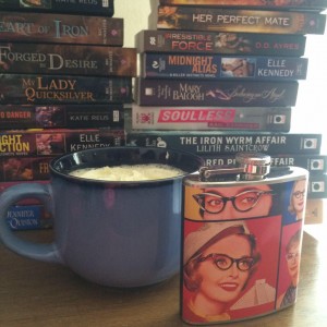 a mug with a SBTB flask alongside it.