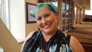 in the front, her bangs are green - it is incredible.