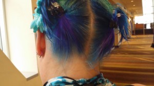 This is Sarah, whose hair is blue with turquoise in the front and purple in the back