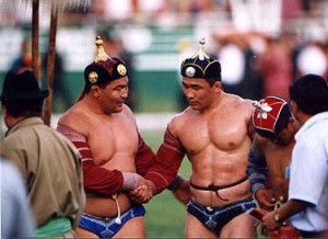 Two Mongoloian wrestlers checking each other out.