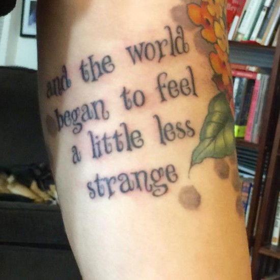 flowers and honeycomb with the words And the world began to feel a little less strange