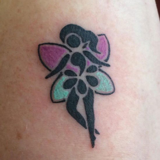 a fairy in black with a semicolon for a head and body with purple and blue wings and a shirt made of black teardrops 