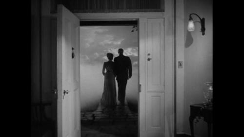 The silhouettes of the two of them as they leave the cottage in the afterlife together 
