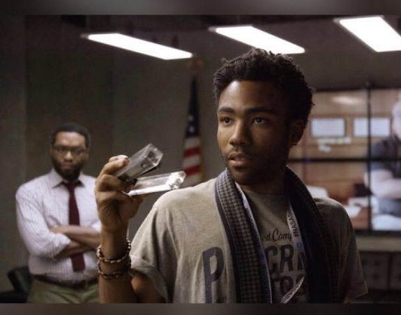 Danny Glover in The Martian, holding a ... I think it is a stapler. I think.