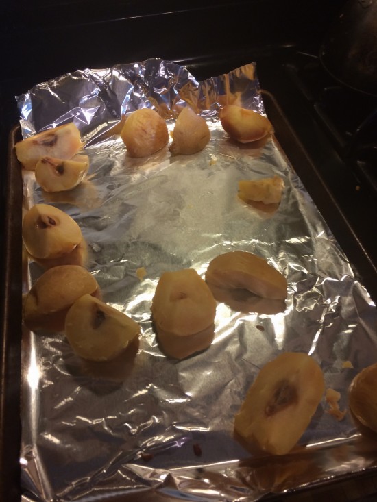 Quince quarters waiting to be peeled