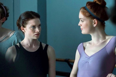 Claire, in a blank tank top leotard, getting sneered at