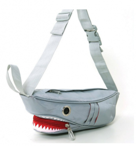 a fanny pack shaped like a shark with an open mouth and teeth on one side 