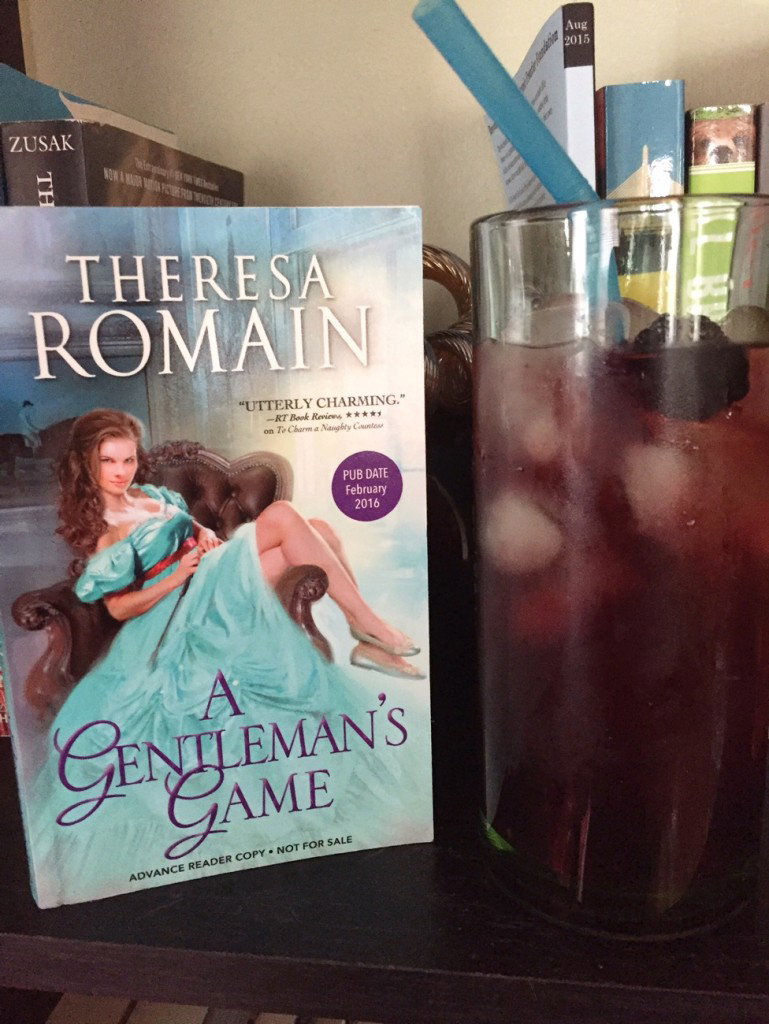 Blackberry mint julep with a copy of A Gentleman's Game by Theresa Romain