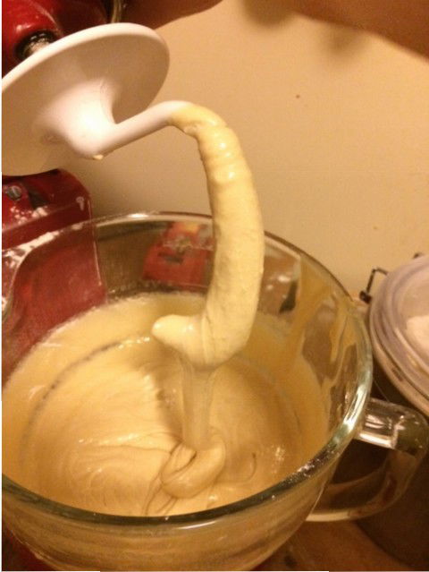 40 minutes of beating. The dough is falling off the dough hook in a thick slow stream