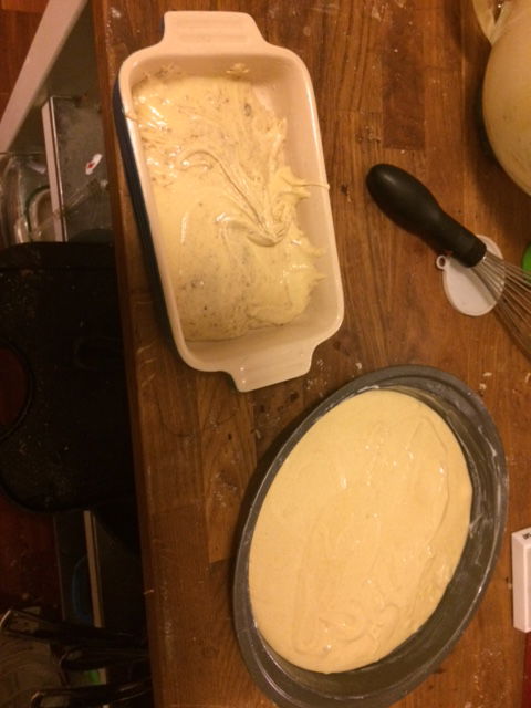 batter in two containers - a smaller rectangle with coriander and anise, and the larger oval without 
