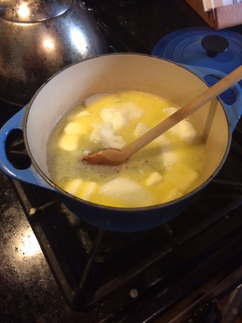 Melting lard and butter into water 