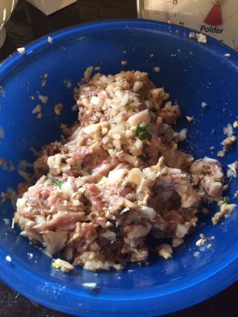 Forcemeat! a mixture of veal, fatback, bread crumbs, and onion!