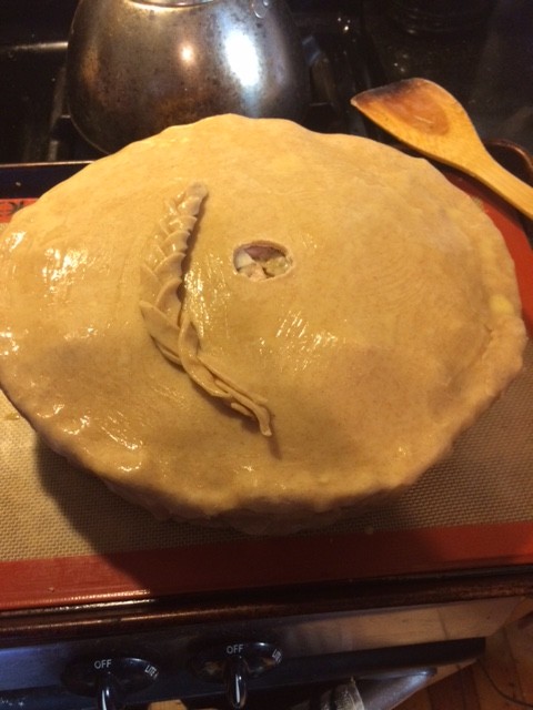 My decoration was just a little bit of braided pastry. It's very pretty, like a stalk of wheat off to the side of the hole in the center 