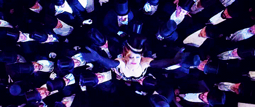 Nicole Kidman being lifted by a bunch of men in tuxes from Moulin Rouge