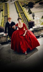 Claire in The Red Dress with panniers and jamie in a cravat it's seriously hot
