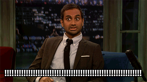 Aziz Ansari saying FUCK with a caption of nothing but exclamation points