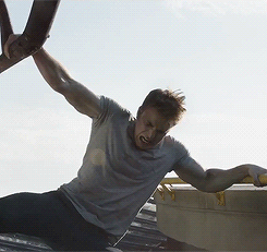 Chris Evans as Cap trying to stop something and this shot is 90 percent biceps and arm muscle pron