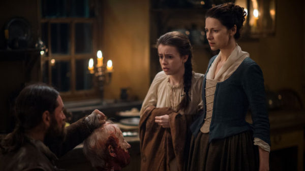 Murtagh offers Claire and Mary the Duke of Sandringham's severed head.