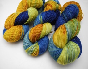 This yarn is called Starry Night and is a mix of yellow gold and dark blue like the Van Gogh painting 