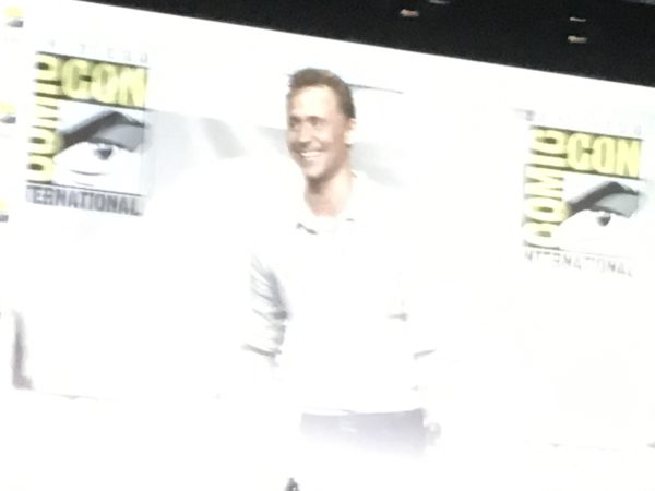 Tom Hiddleston in a cloud of light, looking angelic