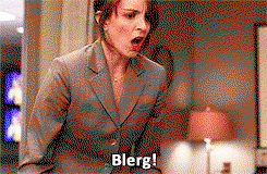 Tina Fey yells "Blergh!" while looking disheveled and enraged