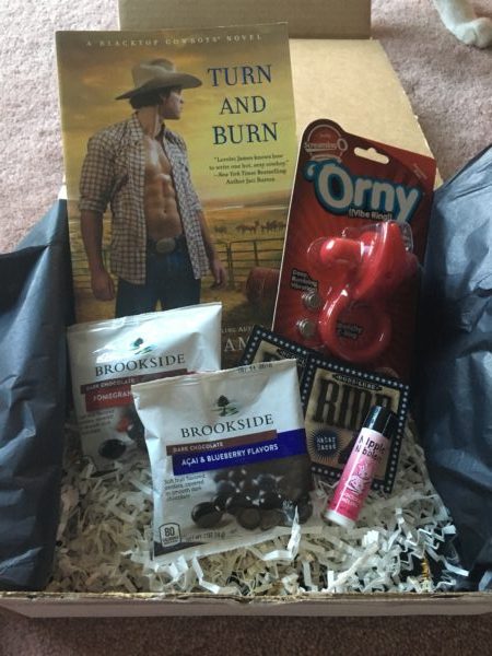 The contents of the Bawdy Bookworms Box neatly displayed