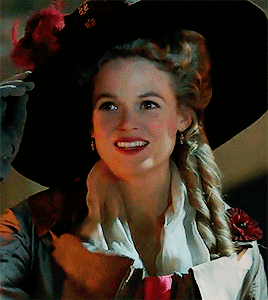 Caroline, smirking at Unwin getting pelted in the face with poop