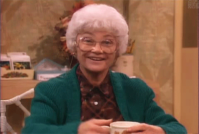 Sophia Petrillo thumping her hand on the table with a big smile