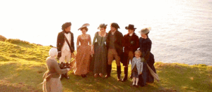 The Cousins Poldark, their spouses, and Geoffy-Chuck, being brought a tray of drinks.