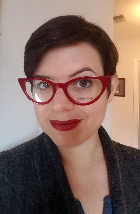 Me modeling red cats eye frames 