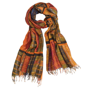 A long wide scarf printed with book spines in shades of gold, red and dark blue 