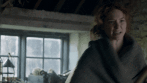 D, throwing her broom at Ross' head and storming out in disgust. He catches it, barely. 