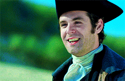 Enys and Caroline, grinning at each other like teenagers. 