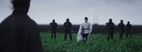 Krennick in a wavy, wind whipped wimpy looking cape