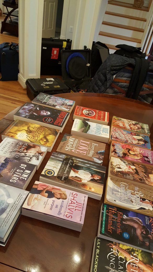 A photo of the romance novels we talked about on camera, with all the equipemnt in the background
