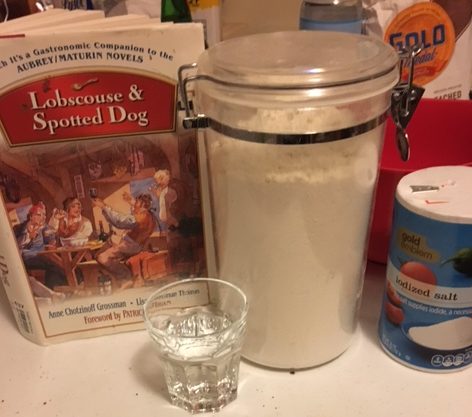 Water, salt and flour next to Lobscouse and Spotted Dog cookbook 