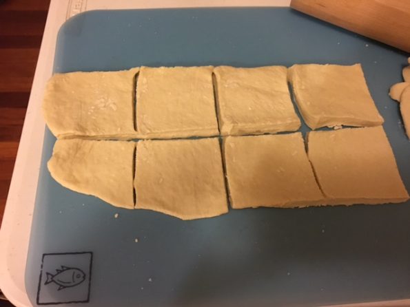 Hard tack rolled out and sliced into eighths, roughly 