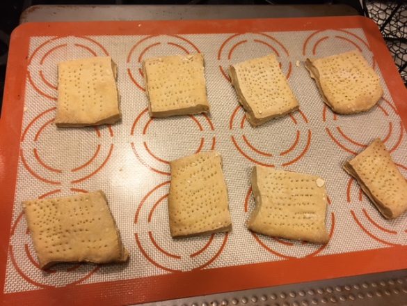 Baked dry hard tack, a little brown on the edges 