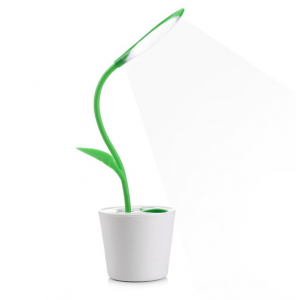 iGrow reading lamp with the bulb in the top of a plant and the rechargable base in a flowerpot so it looks like a plant ... that turns on light a light. its so cute 
