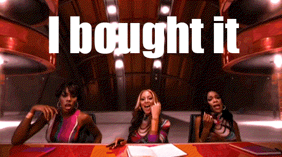 Destiny's Child sits around a table while the words I Bought It flash overhead