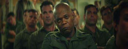 Samuel L. Jackson, looking cranky, and his team