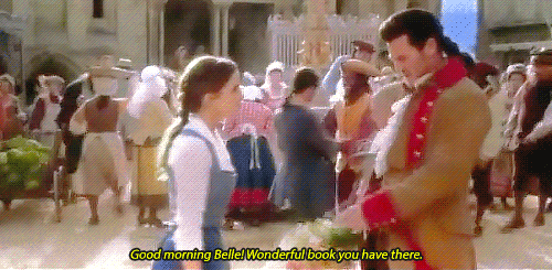 Gaston stopping Belle to say, Good morning Belle, wonderful book you have there
