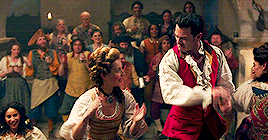 Gaston and LeFeu jumping on tables and dancing in their bar scene