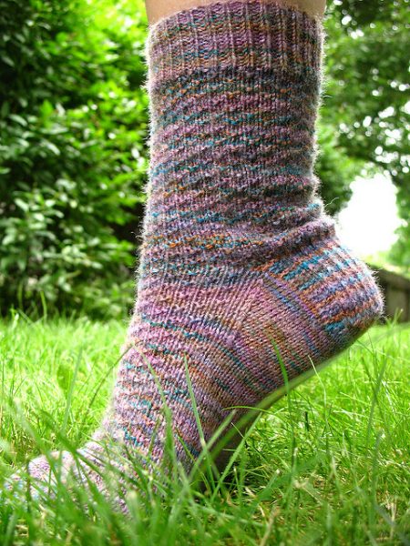 A colorful sock with a slightly bumpy texture.