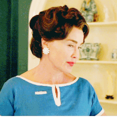 Jessica Lange as Joan Crawford smoking a cigarette 