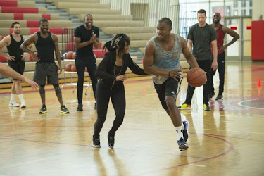 Rachel and the dudes are playing basketball.