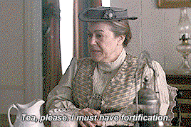 Rachel Lynde, seated at the table in Green Gable's kitchen, saying Tea please, I must have fortification. Don't we all.